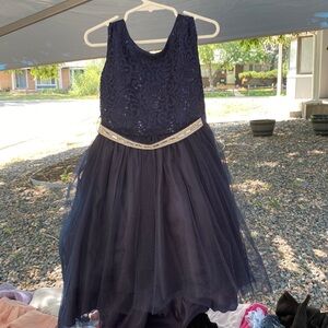 A navy blue dress with sparkles